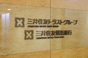 Sumitomo Mitsui Trust Bank sign and logo